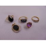 Three 9ct gold rings set with various stones and two pendants, approx total weight 15.7g