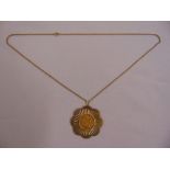 1902 half Sovereign set in 9ct pendant on a 9ct chain, approx total weight 12.4g