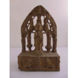 An early oriental carved Stele stone figurine of an elder in an architectural framework, the