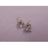 A pair of 9ct white gold earrings set with cubic zirconas, approx total weight 1.3g