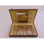 A cased set of Kings pattern silver handled fish eaters for 12 place settings