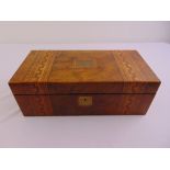 An Edwardian rectangular mahogany writing slope, the hinged cover and sides decorated with satinwood