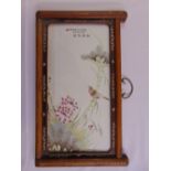 A Chinese rectangular porcelain hand painted panel of flowers and a bird in hardwood frame, 49 x