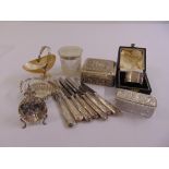 A quantity of silver and white metal to include covered boxes, bonbon dishes, a cased napkin ring