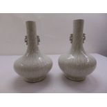 A pair of Chinese Ge type crackle glaze vases, Qianlong marks to the bases, on carved pierced