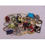 A quantity of costume jewellery to include necklaces, bangles and earrings