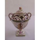 A continental Faience pot pourri vase and cover with two side handles on rectangular base