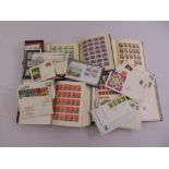 A quantity of GB stamps in albums and first day covers
