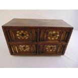 Indo-Portuguese rectangular cabinet, the four drawers carved with free standing columns and inset