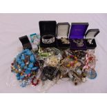 A quantity of costume jewellery to include necklaces, brooches, earrings, pendants and rings