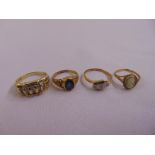 Four 9ct yellow gold rings, approx total weight 10.1g