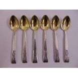Six Russian white metal teaspoons with stylised terminals