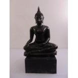 A Thai cast bronze figurine of a seated Buddha on rectangular plinth, 76cm (h)