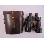 A pair of MK 5 military binoculars stamped RL in original leather case