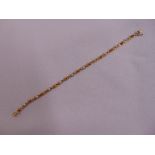 9ct yellow gold bracelet set with rubies and diamonds, approx total weight 5.8g