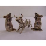 A pair of silver condiments in the form of mice and a silver figurine of a bull, A/F