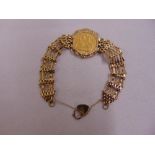 9ct gold gatelink bracelet inset with a 1911 gold Sovereign, approx total weight 17.4g