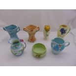 A quantity of Art Deco porcelain to include Clarice Cliff, Arthur Wood Garden wall vases, a