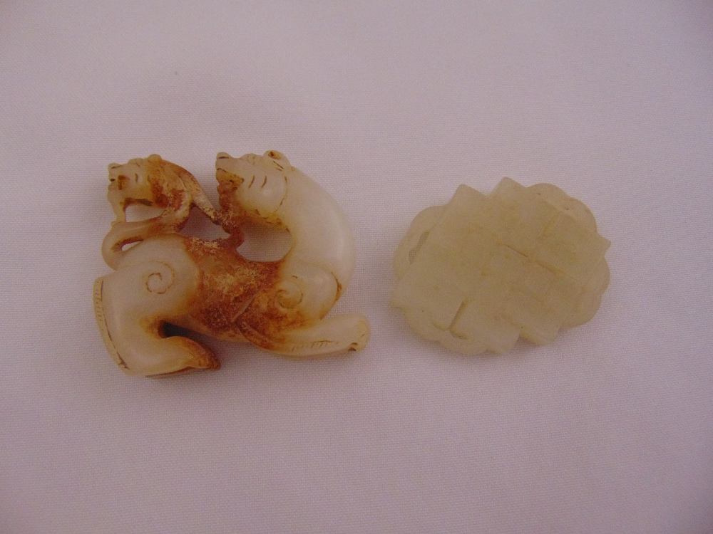 Two Chinese mutton fat jade pendants