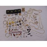 A quantity of silver and costume jewellery to include necklaces, bracelets, earrings, rings,