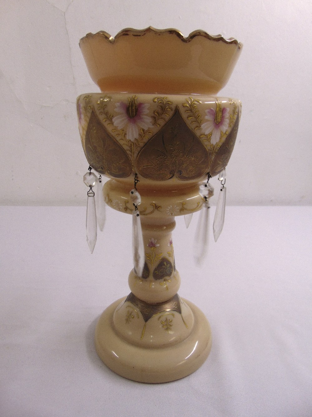 A cream glass lustre on baluster stem and raised circular base, 36cm (h)