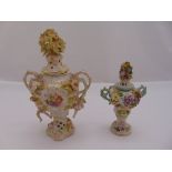 Two Sitzendorf pot-pourri holders with pull off covers on raised bases, 19.5cm (h)