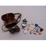 A quantity of collectables to include a pair of WWI Dollond Binoculars, a WWII military compass, two