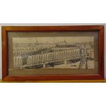 A framed and glazed monochromatic etching of Place Dauphine Paris, 24 x 61.5cm