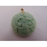 A Chinese carved jade with a 14ct yellow gold pendant fitting