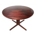 A mid 20th century rosewood circular pedestal dining table by Gudme M›belfabrik of Denmark on