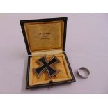 1914 Iron Cross 1st class with pin clasp, stamped to back KO and a white metal ring embossed 1914