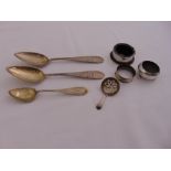 A quantity of silver and white metal to include salts, a napkin ring and table spoons