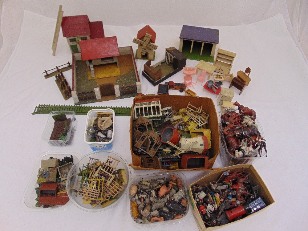 A quantity of diecast figurines and farmyard accessories