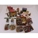 A quantity of diecast figurines and farmyard accessories