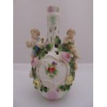 A Sitzendorf porcelain vase decorated with putti, flowers and leaves marks to the base, A/F, 24cm (