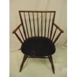 An early oak spindle back chair on four turned cylindrical legs