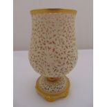 A Graingers Royal Worcester reticulated vase on raised circular base with gilded rim and