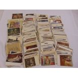 A quantity of antique and vintage postcards of various subjects