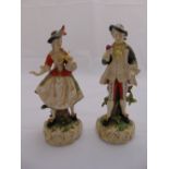 Two H H Kunst Dresden Art figurines of a gentleman and lady in 18th century costume, marks to the