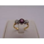 18ct gold, ruby and diamond three stone ring, approx total weight 3.3g