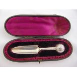 A late Victorian cased silver marrow scoop with ball finial engraved with flowers and leaves, London