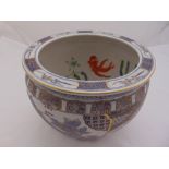 A Chinese fish bowl of customary form decorated with flowers and scrolls, 28.5cm (h) 36cm diameter