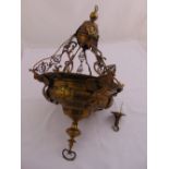A 19th century brass chandelier of circular form with applied decoration, eight pierced suspensory