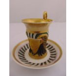 Royalware hand painted cabinet cup and saucer in the Egyptian style with gilded highlights, 11.