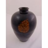 A Chinese Jiangware baluster vase with three leaf decorations to the sides, 29.5cm (h)