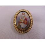 A Victorian seed pearl and enamel brooch tested 10ct