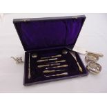 A quantity of silver and white metal to include a cased dressing table set, a pair of salts, a