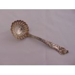 A Victorian silver straining spoon, pierced bowl the handle chased with leaves and flowers, circa