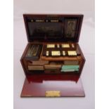 A Victorian mahogany games compendium, by Charles Goodall and Sons of London to include playing