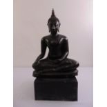 A Thai cast bronze figurine of a seated Buddha on rectangular plinth, 76cm(h)